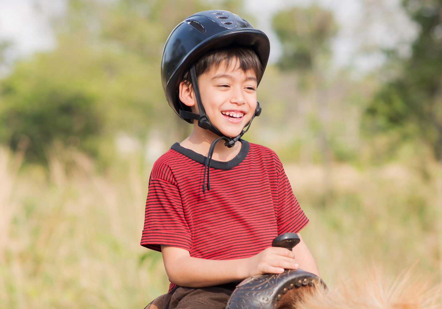 Cataloochee Ranch - Little Boy Riding A Horse